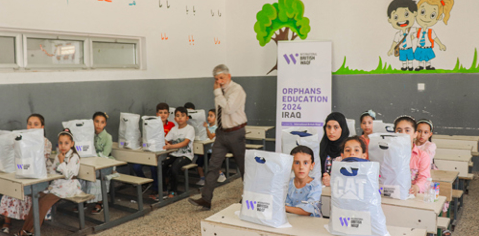 Student in a classroom with IBW bags.